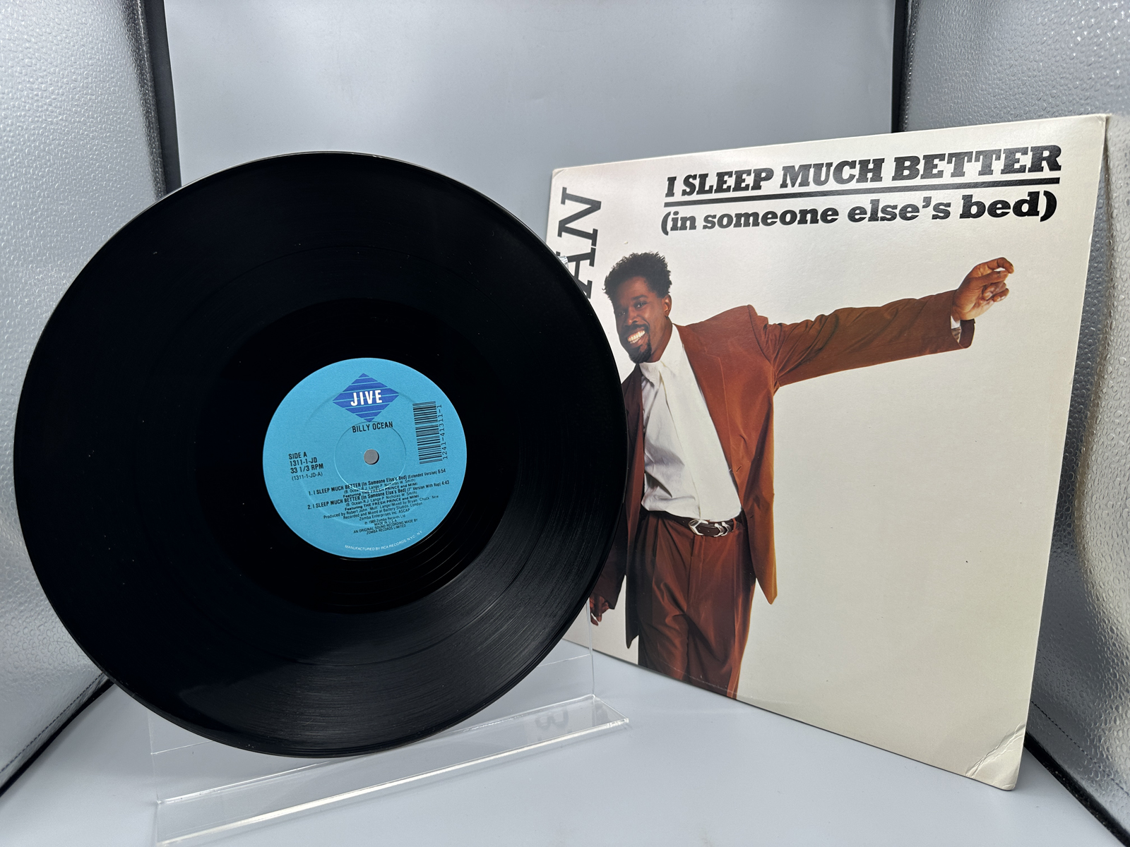 1989 Jive Records / RCA Records Billy Ocean "I Sleep Much Better (In Someone Else's Bed)" Single Vinyl Record - #1311-1-JD