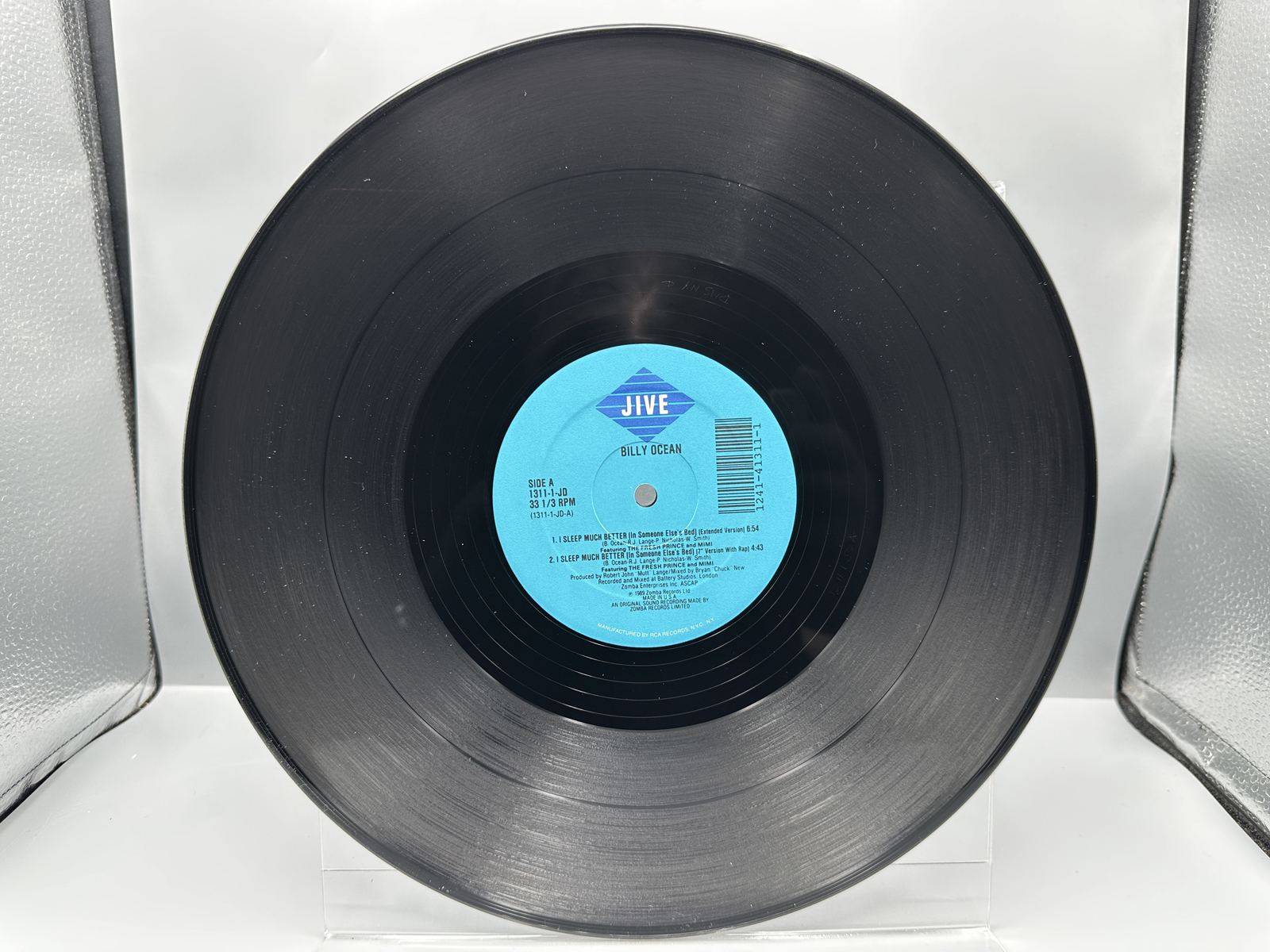 1989 Jive Records / RCA Records Billy Ocean "I Sleep Much Better (In Someone Else's Bed)" Single Vinyl Record - #1311-1-JD