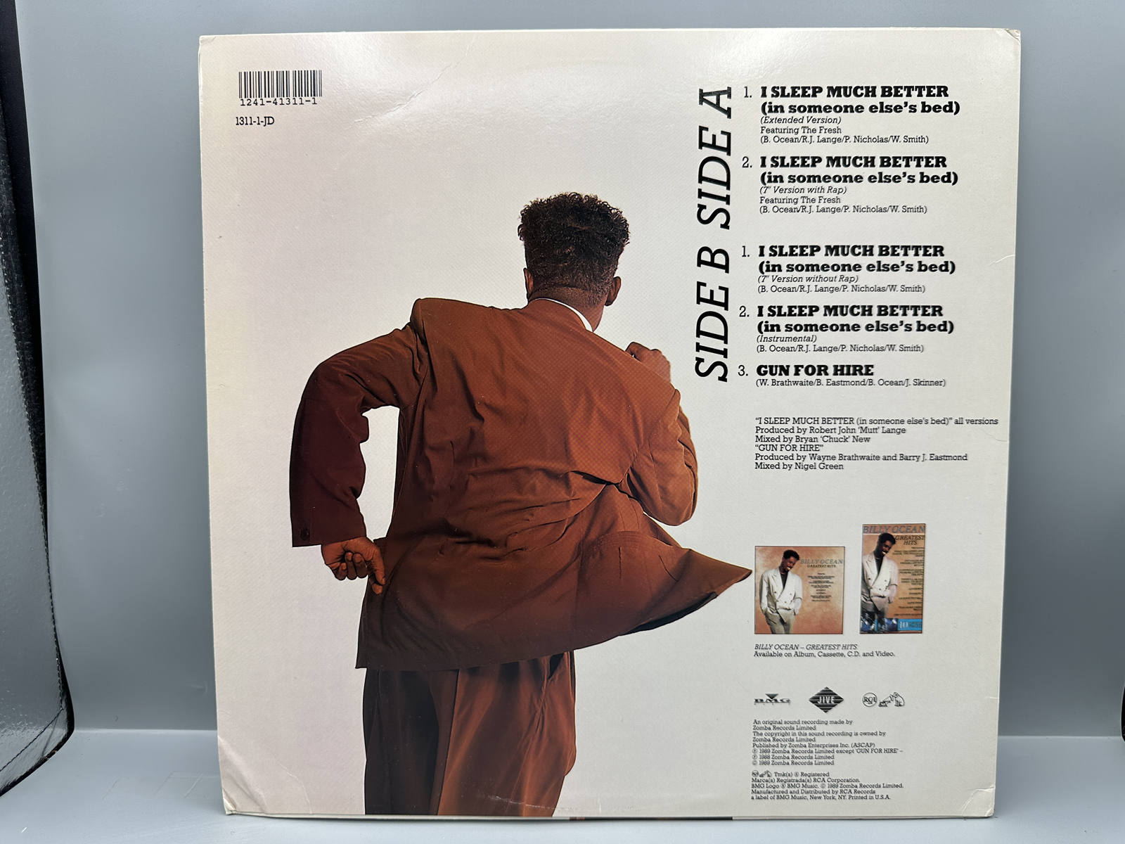 1989 Jive Records / RCA Records Billy Ocean "I Sleep Much Better (In Someone Else's Bed)" Single Vinyl Record - #1311-1-JD