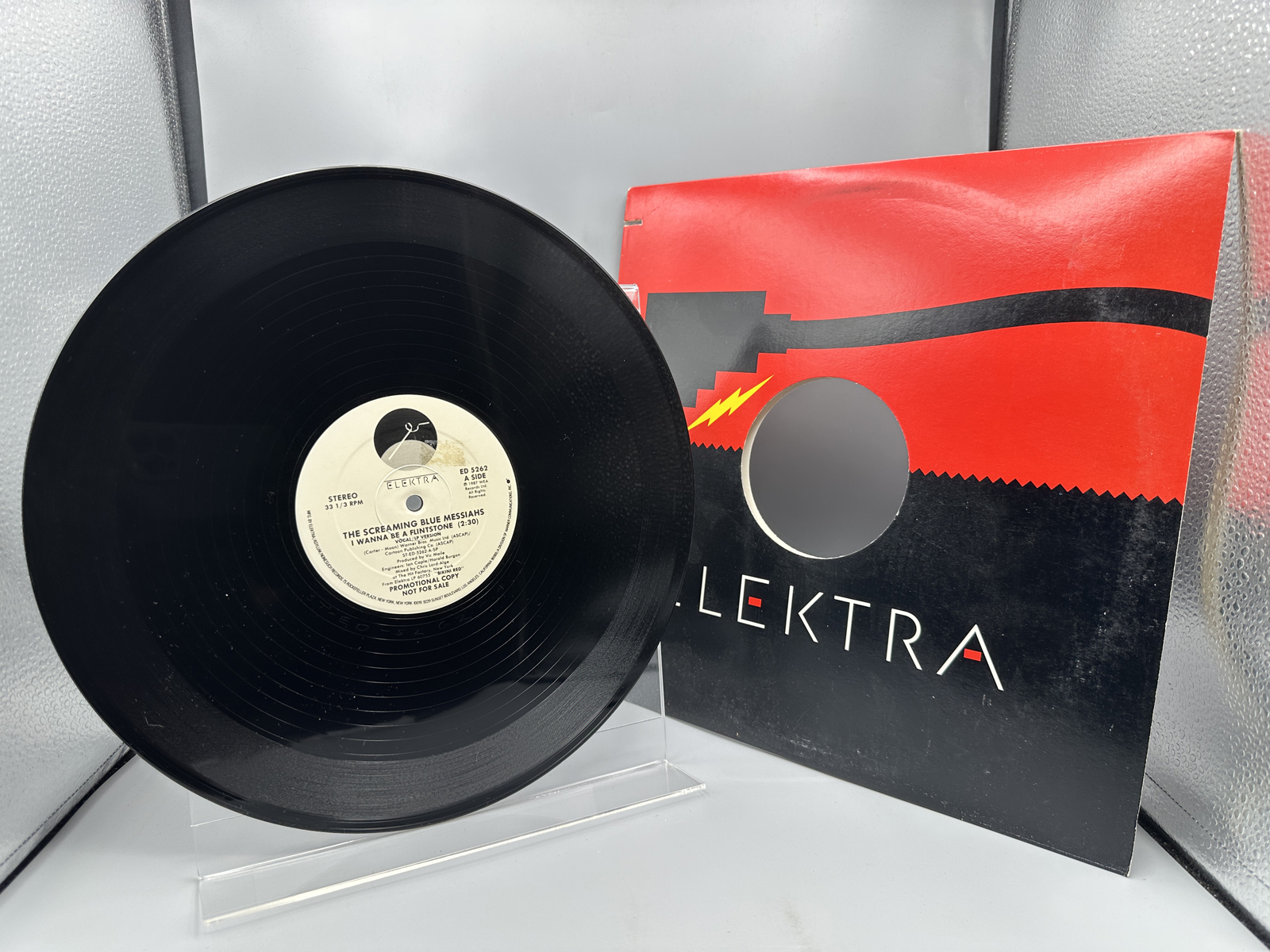 1987 Elektra Records The Screaming Blue Messiahas 'I Wanna Be a Flintstone' Promo Single Vinyl Record - ED 5262