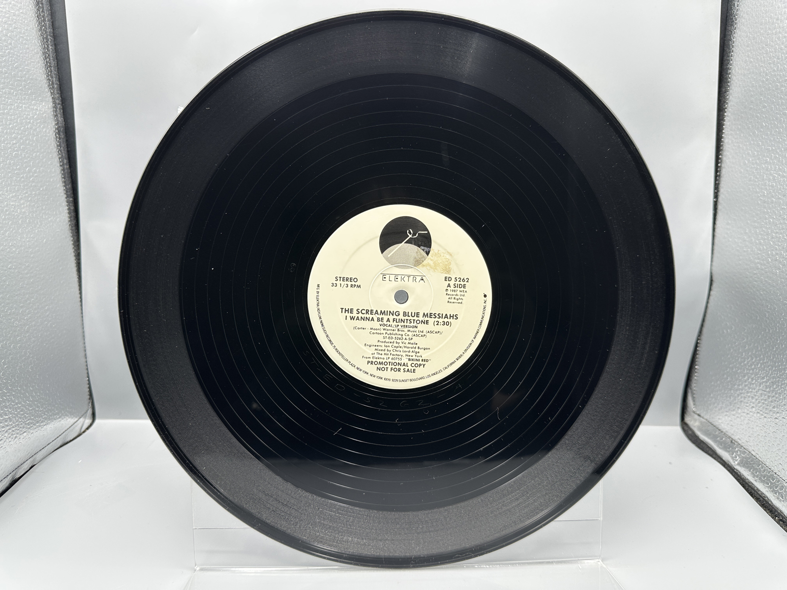 1987 Elektra Records The Screaming Blue Messiahas 'I Wanna Be a Flintstone' Promo Single Vinyl Record - ED 5262