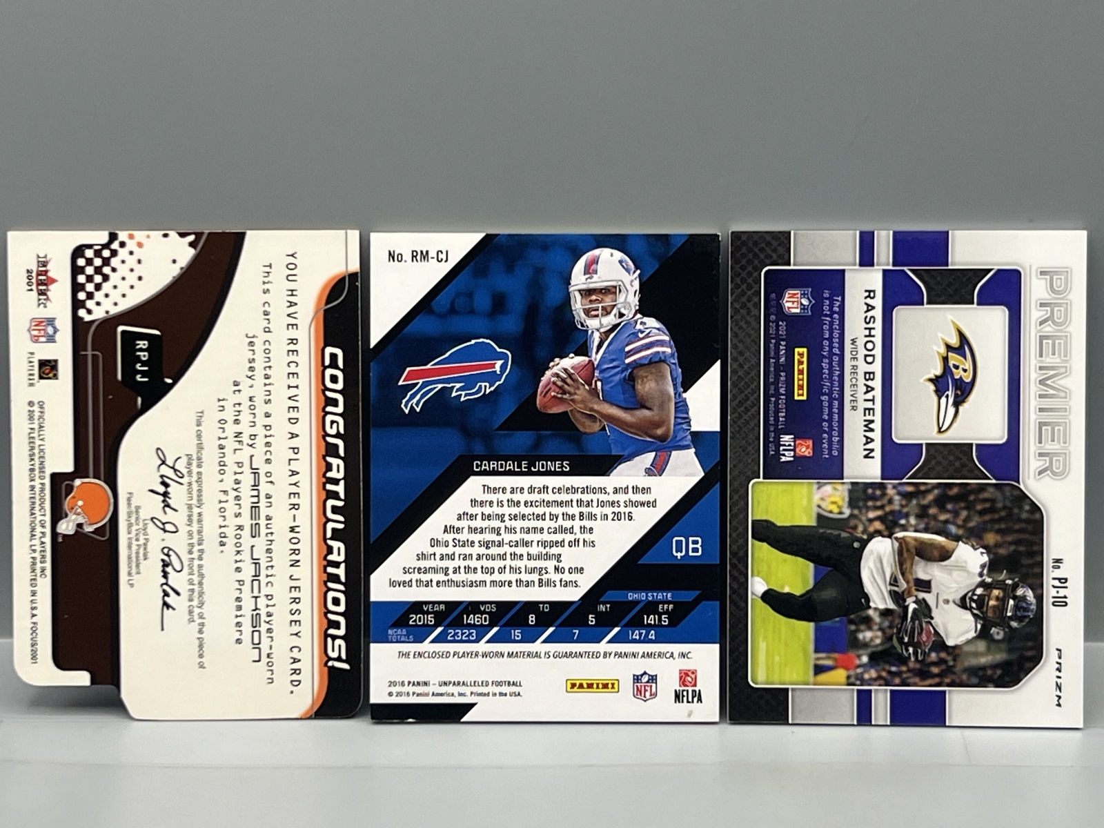 (3) Assorted Football Jersey Relic Rookie Cards