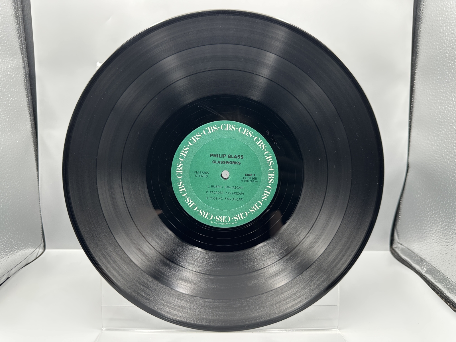 2 LP Lot: Philip Glass: Glassworks (1982); and Polyrock - Radio Special Volume III (1980) - features interview with producer Philip Glass, L