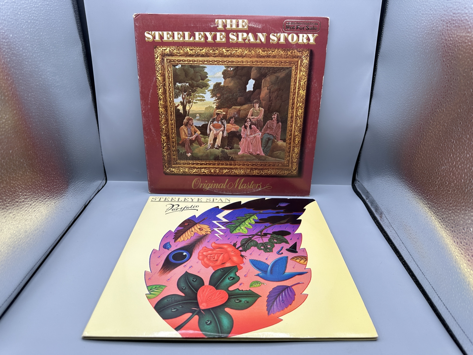 Steeleye Span (2 LP Lot): The Steeleye Span Story - Original Masters (1977), 2 LPs, gatefold, promo stamp on cover; and Portfolio (1988), 2 