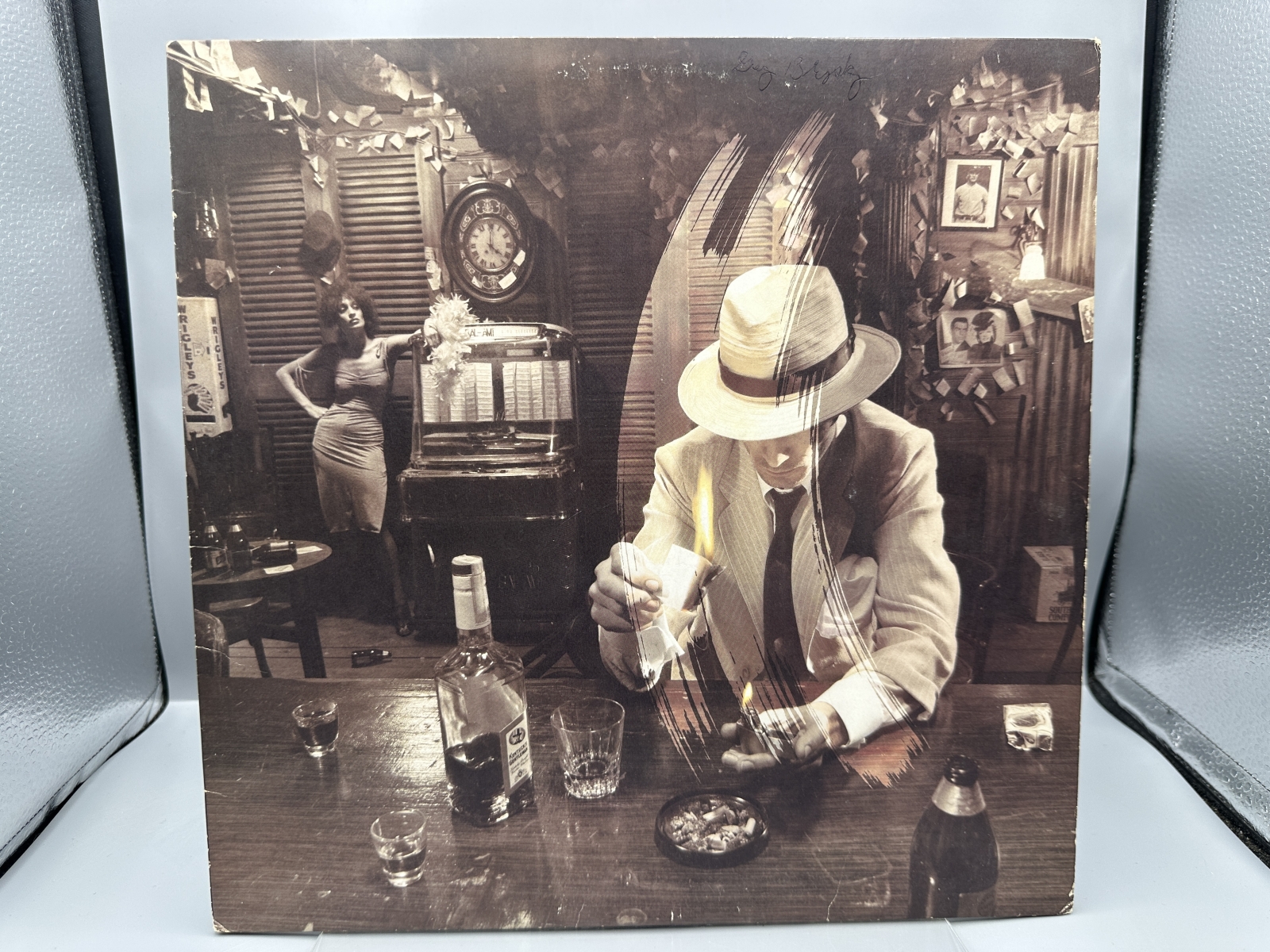 Led Zeppelin: In Through The Out Door (1979), Cover is Version 'C', outer sleeve (stamped paper bag) is included (but taped at seams), previ