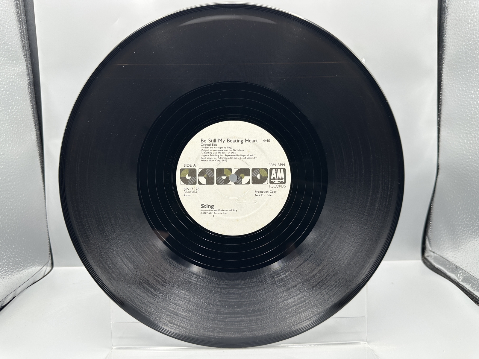 Sting (2 Record Lot): Be Still My Beating Heart (1987) and We'll Be Together/Conversation With A Dog (1987). Both records are 12-inch 33 1/3