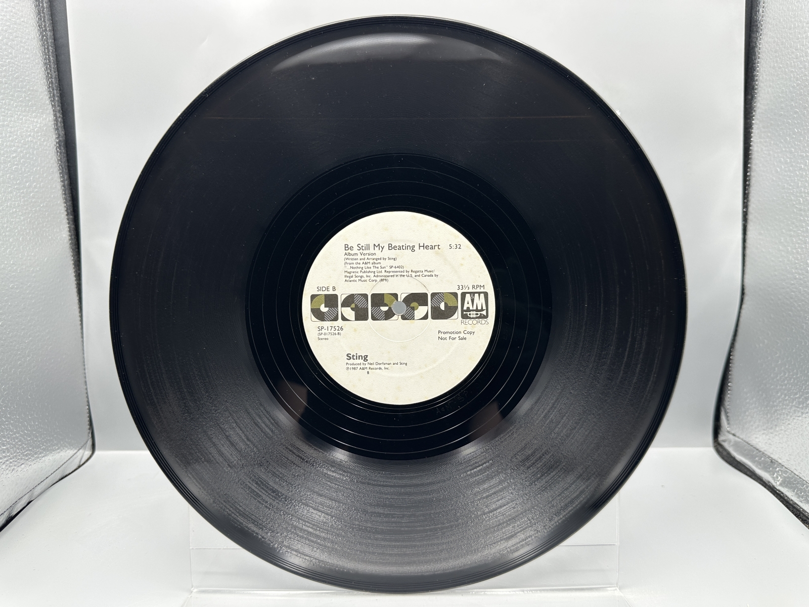Sting (2 Record Lot): Be Still My Beating Heart (1987) and We'll Be Together/Conversation With A Dog (1987). Both records are 12-inch 33 1/3
