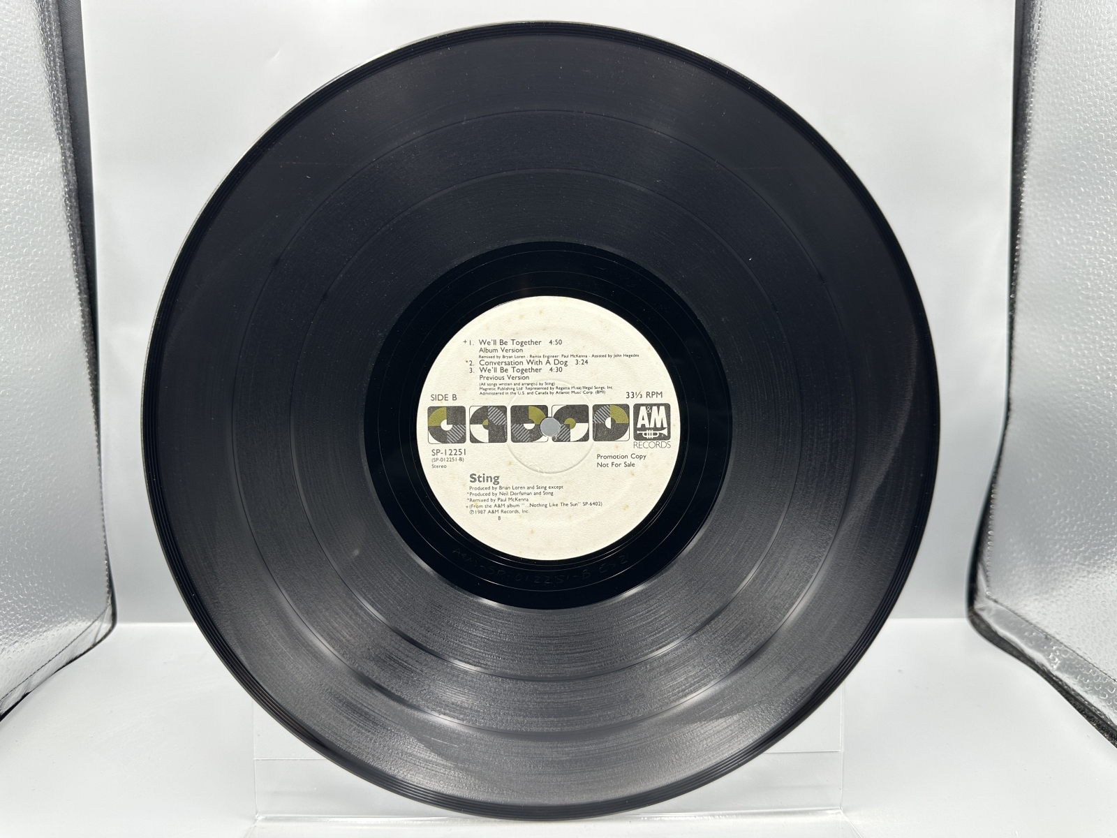 Sting (2 Record Lot): Be Still My Beating Heart (1987) and We'll Be Together/Conversation With A Dog (1987). Both records are 12-inch 33 1/3