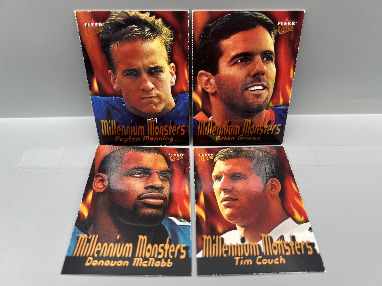 (4) 2000 Fleer Ultra Millennium Monsters Cards W/ Peyton Manning - chipping around edges