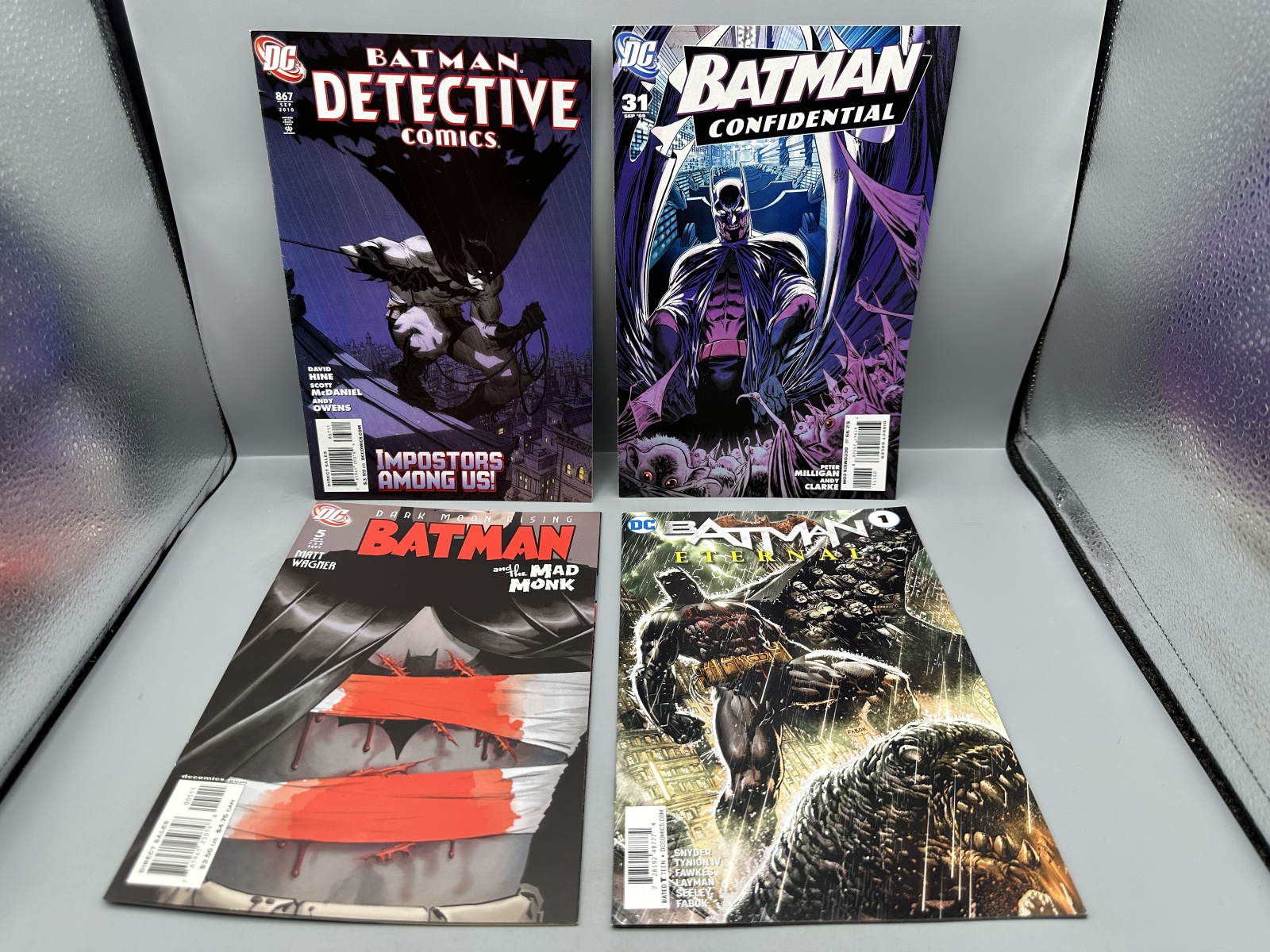 (4) DC Comics Batman Comic Books - Including Detective Comics #867 (2010), Batman Confidential #31 (2009), Batman and the Mad Monk #5 (2007)