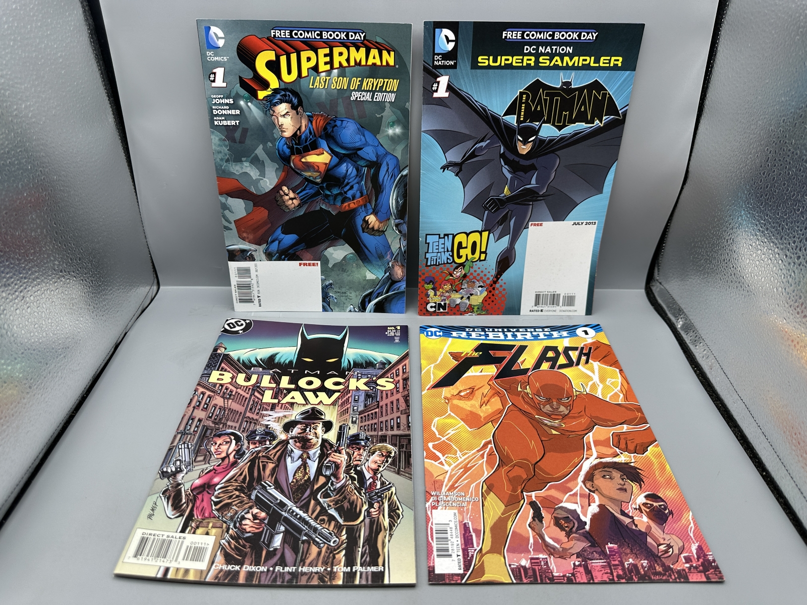 (4) DC Comics Books - Including Superman: Last Son of Krypton Special Edition #1 (2013), DC Nation Super Sampler #1 (2013), Batman: Bullock'