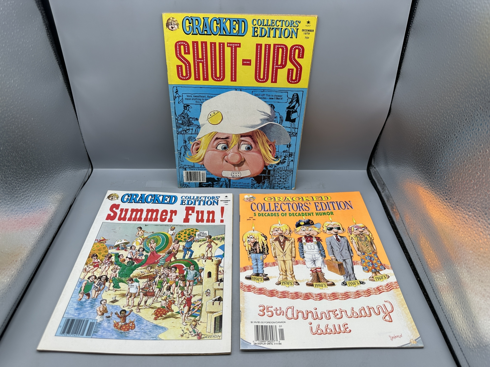(3) Major Magazines and Globe Communications Cracked Collectors' Edition - John Severin cover art