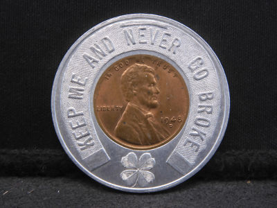 Encased 1948-D (Uncirculated) Good Luck Wheat Cent. Old Stamp and Coin Shop, Detroit, Michigan.