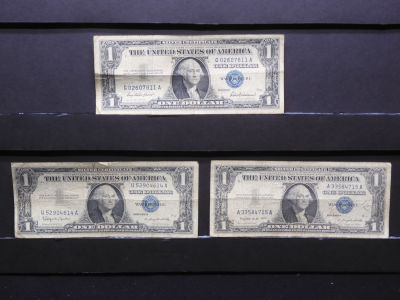 1957, 1957-A, 1957-B $1 Blue Seal U.S. Silver Certificates. Bust Of Washington.