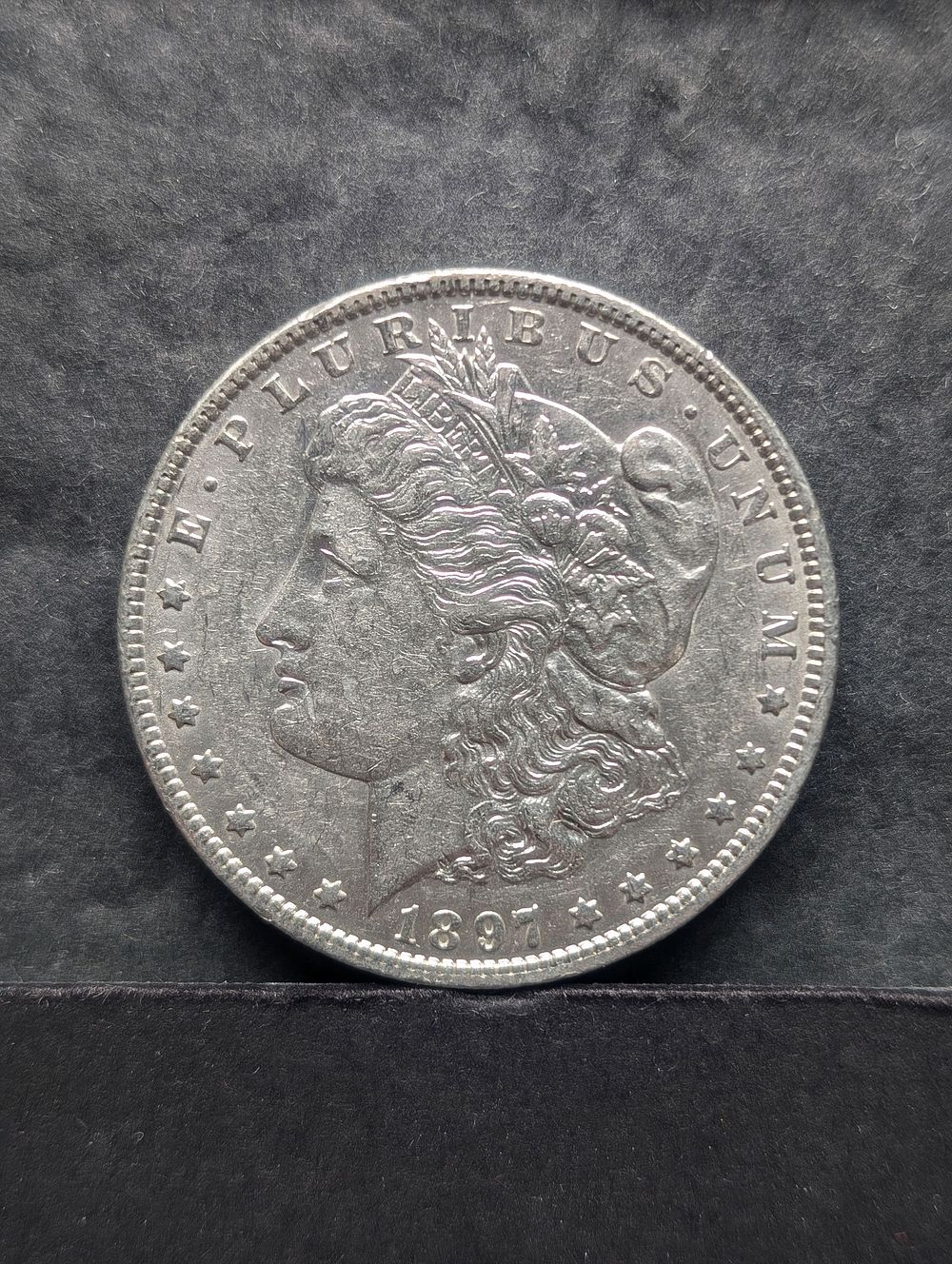 1897-O Morgan Silver Dollar 
Condition: You will receive a Tracking Number from STAMPS.COM once 
