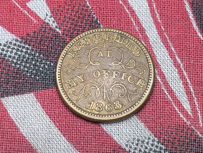1863 Merchant Civil War Token. OBV: "Redeemed At My Office". REV: "Oliver Boutwell, Miller 