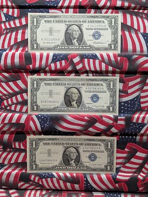 Three 1957 One Dollar Silver Certificates: 1957, 1957A, & 1957B. GEM Uncirculated. Very Crisp. T 