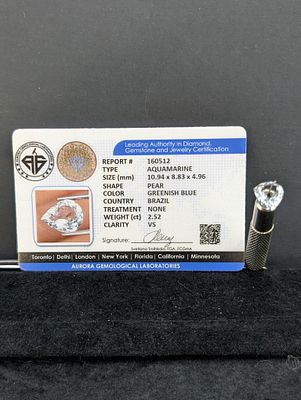 Pear-Cut Blue Stone, Approx. 2.52 Carats (Aurora Certification). A pear-cut blue stone described 