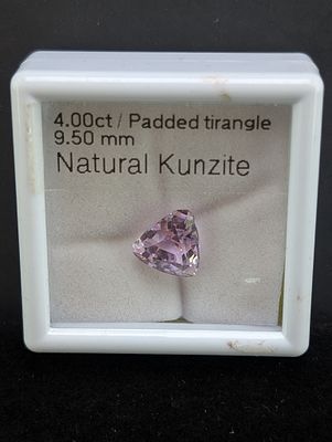 Padded Triangle-Cut Pink Stone, Approx. 4.00 Carats. A padded triangle-cut pink stone described 