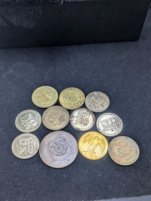 (11) Various Vintage Tokens Condition PLEASE NOTE Some coins may have a grade on the package or 