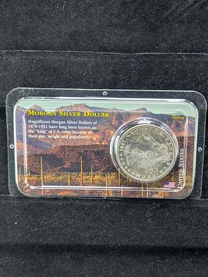1881-S Morgan Dollar in Littleton Package Condition PLEASE NOTE Some coins may have a grade on 
