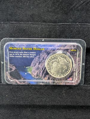 1921 Morgan Dollar in Littleton Package Condition PLEASE NOTE Some coins may have a grade on 