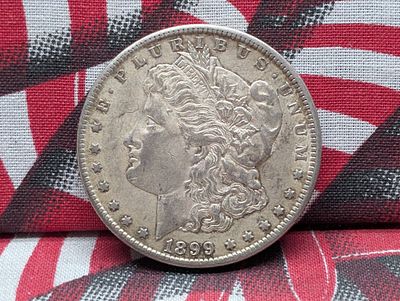 1899-O Morgan Silver Dollar Condition PLEASE NOTE Some coins may have a grade on the package or 