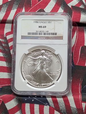 US 1986 $1 American Silver Eagle, NGC MS 69, One Troy Ounce .999 Fine Silver Condition PLEASE 