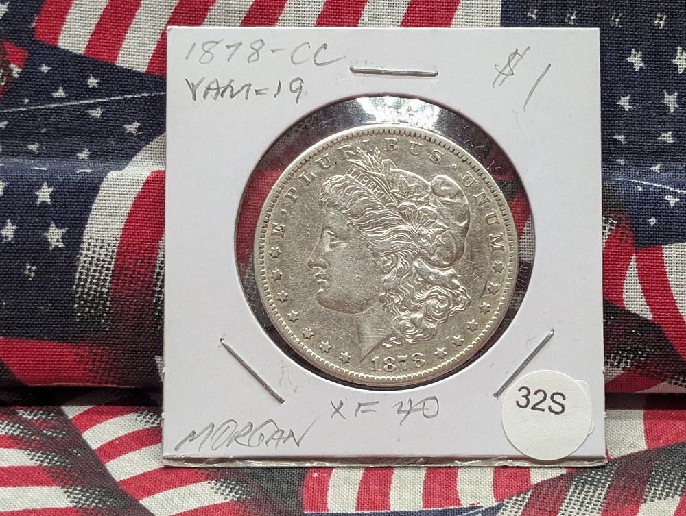 US 1878-CC Morgan Silver Dollar, VAM-19
Condition 
PLEASE NOTE Some coins may have a grade on 
