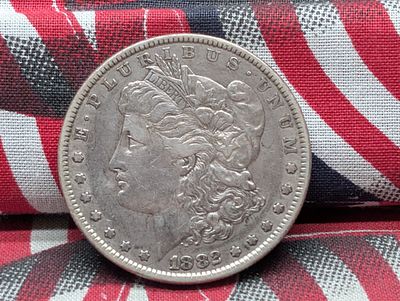 US 1882 Morgan Dollar, Silver, KM-110 Condition PLEASE NOTE Some coins may have a grade on the 