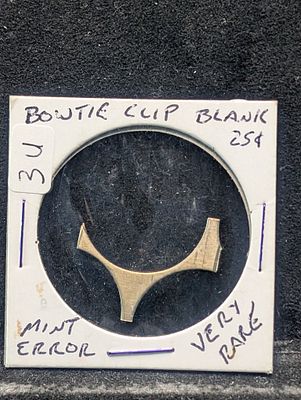 Very Rare “Bow-Tie” Quarter clip blank. Condition PLEASE NOTE Some coins may have a grade on 
