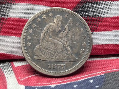 1877 w/ Motto Seated Liberty Quarter w/ Scratches. Condition PLEASE NOTE Some coins may have a 