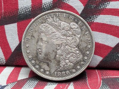 1886-O Morgan Silver Dollar Condition PLEASE NOTE Some coins may have a grade on the package or 