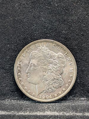 1904-O Morgan Dollar Condition PLEASE NOTE Some coins may have a grade on the package or in the 
