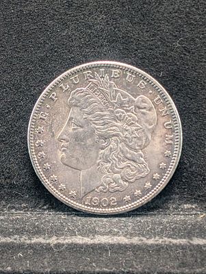 1902-O Morgan Silver Dollar Condition PLEASE NOTE Some coins may have a grade on the package or 