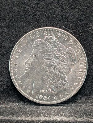 1884-O Morgan Silver Dollar Condition PLEASE NOTE Some coins may have a grade on the package or 