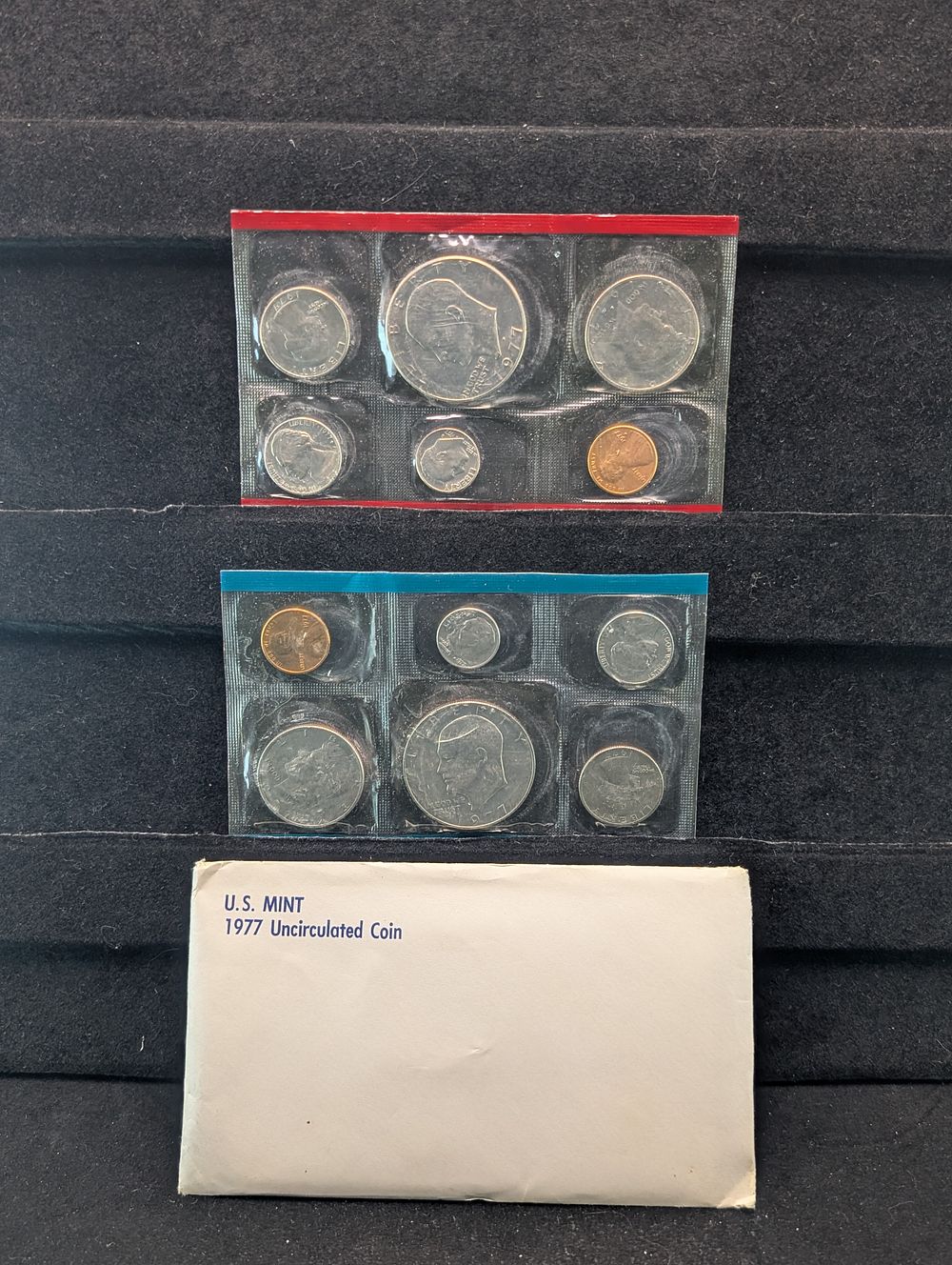 1977 P&D US Uncirculated Coin Set In OGP
Condition 
PLEASE NOTE Some coins may have a grade on 