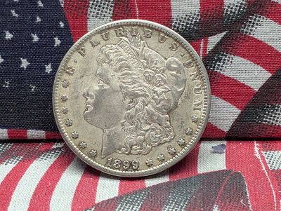 1899-O Morgan Silver Dollar Condition PLEASE NOTE Some coins may have a grade on the package or 