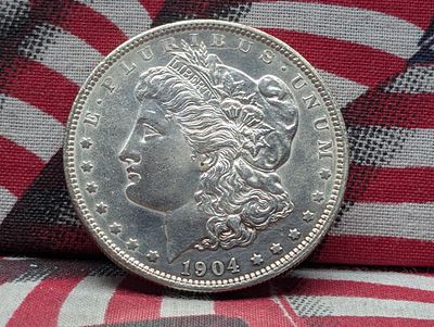 1904-O Morgan Dollar Condition PLEASE NOTE Some coins may have a grade on the package or in the 