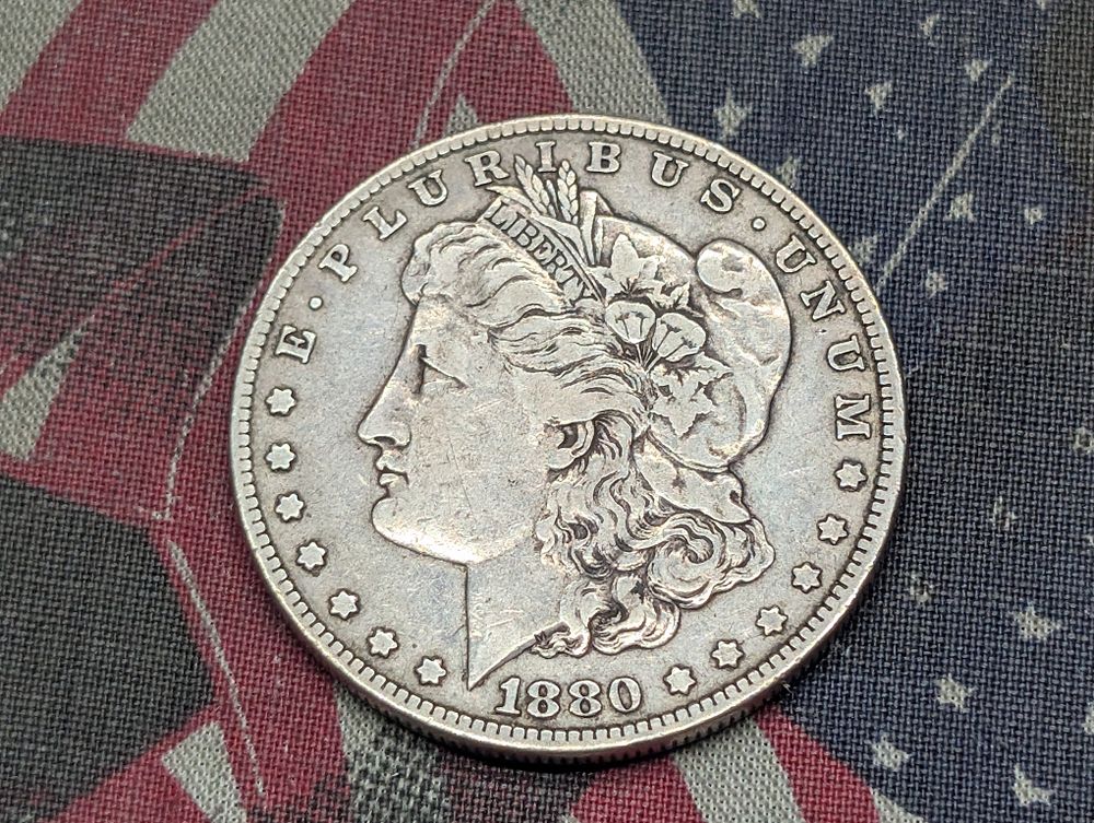 1880-O Morgan Silver Dollar
Condition 
PLEASE NOTE Some coins may have a grade on the package 
