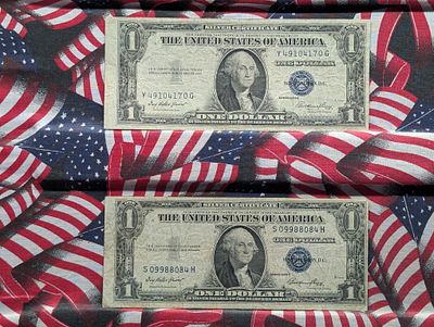 Two- 1935E-$1 Silver Certificates, Off Center Condition PLEASE NOTE Some coins may have a grade 