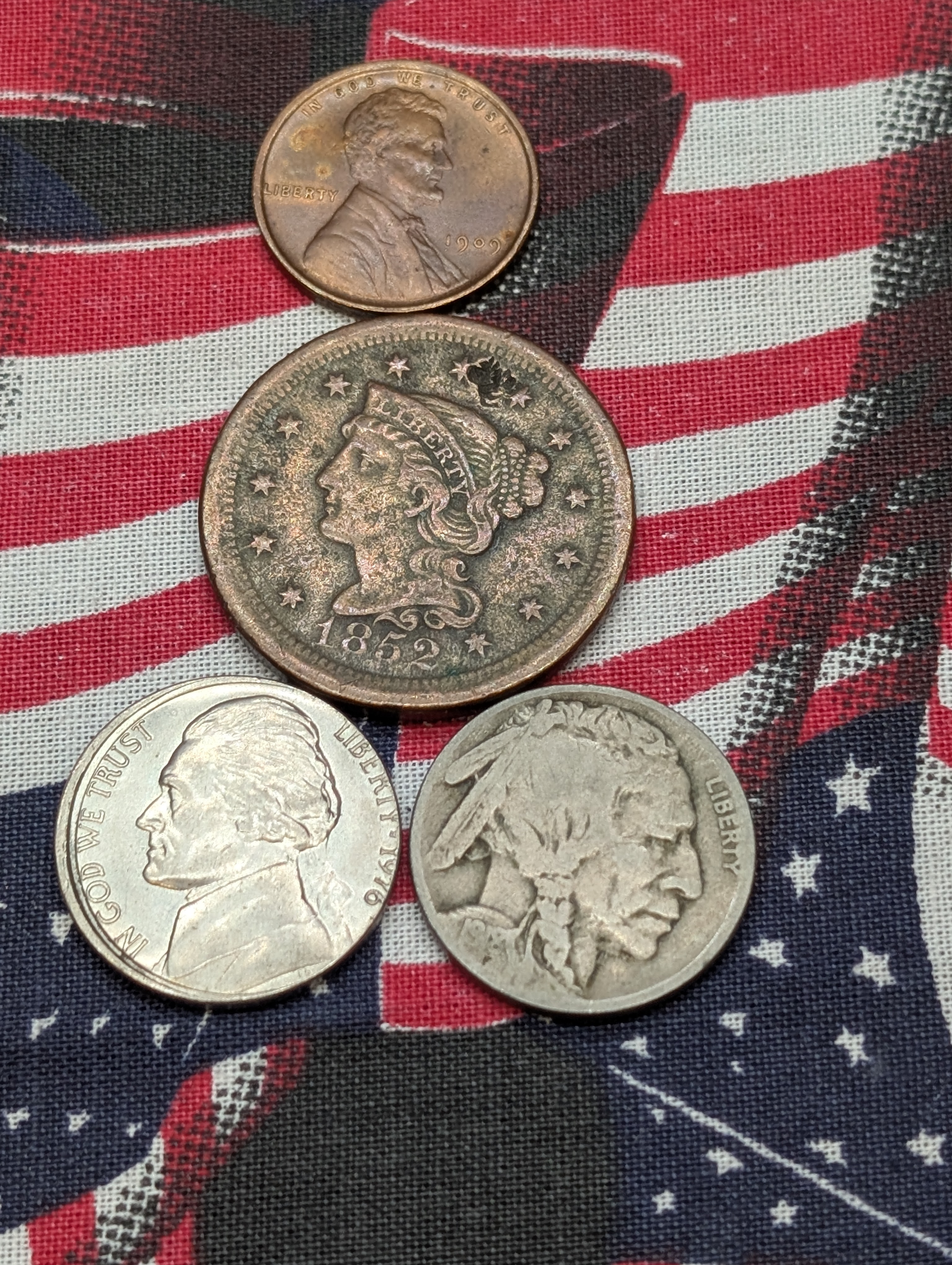 1852 U.S. Large Cent, 1976 Off Center Error Jefferson Nickel, 1918-S Indian Head Buffalo Nickel, 1909 VDB Lincoln Wheat Cent