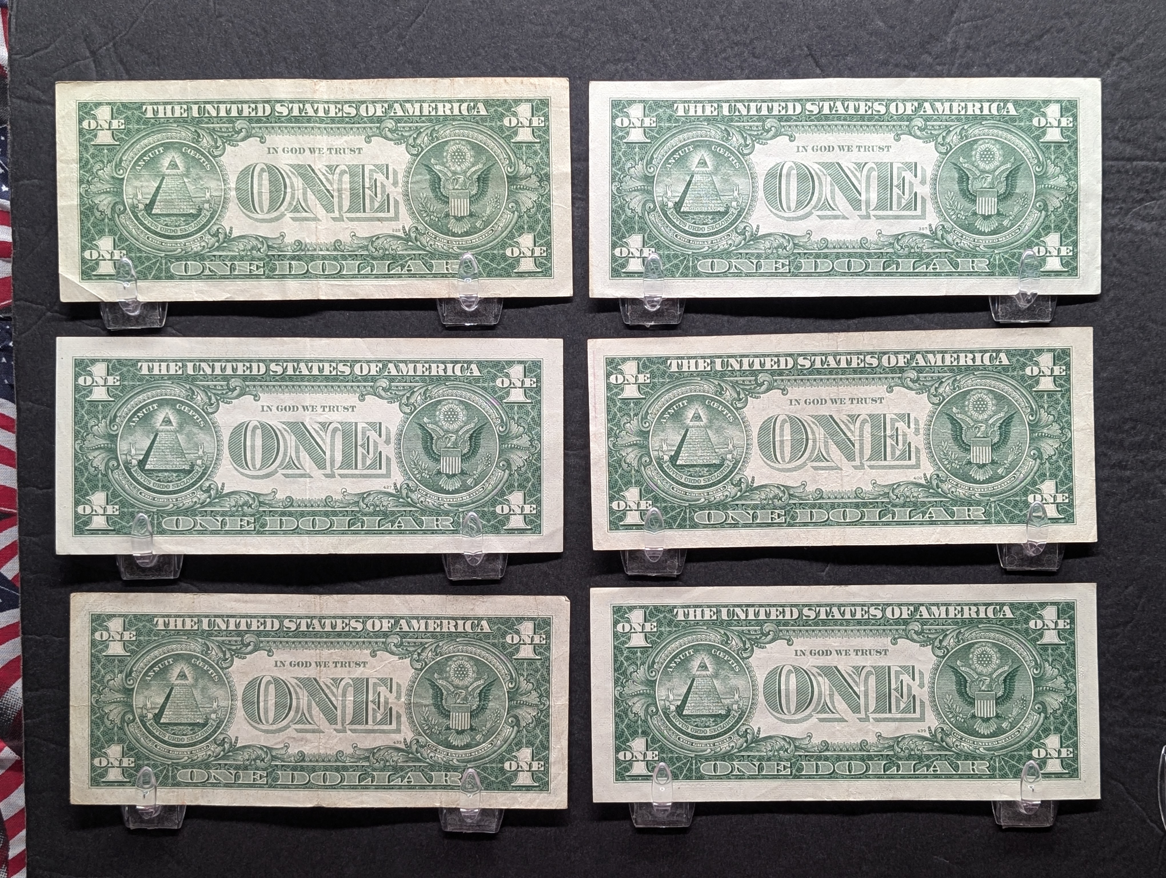 (2) 1957, (2) 57-A, (2) 57-B Series $1.00 Silver Certificates