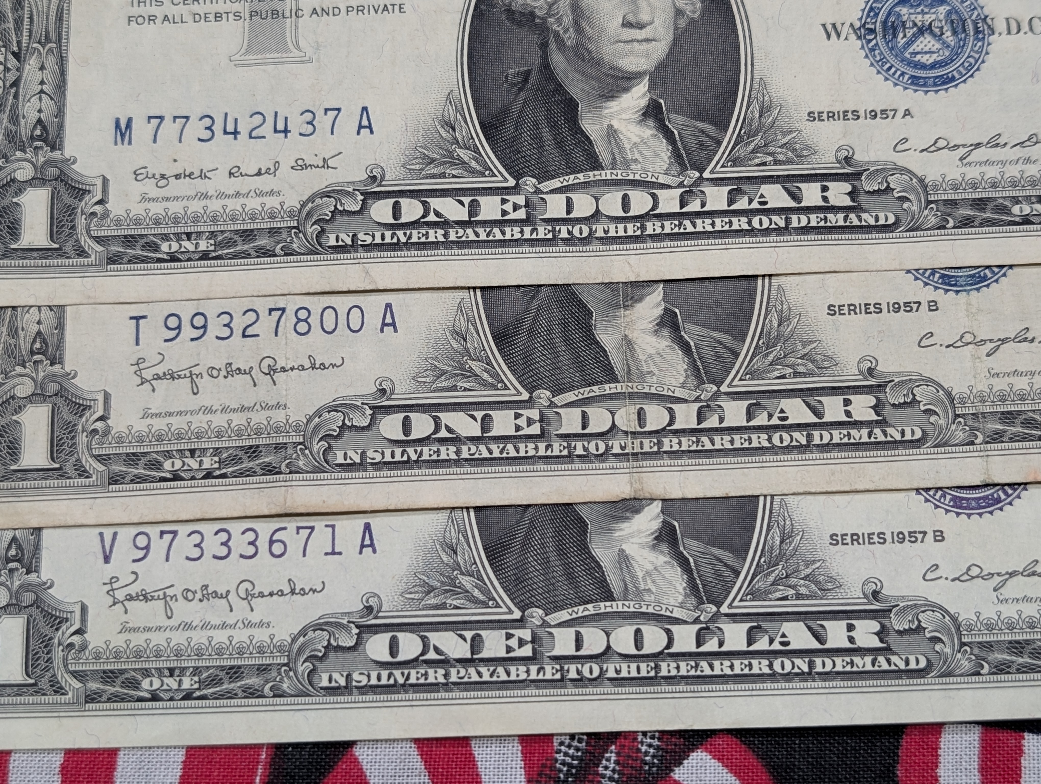 (2) 1957, (2) 57-A, (2) 57-B Series $1.00 Silver Certificates