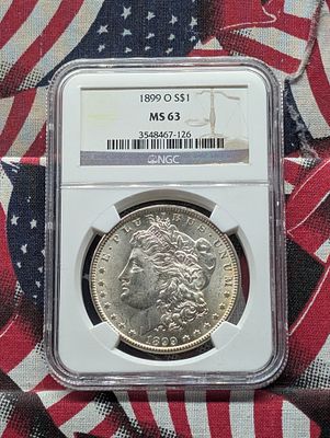 1899-O Morgan Silver Dollar - NGC MS63 Condition PLEASE NOTE Some coins may have a grade on the 