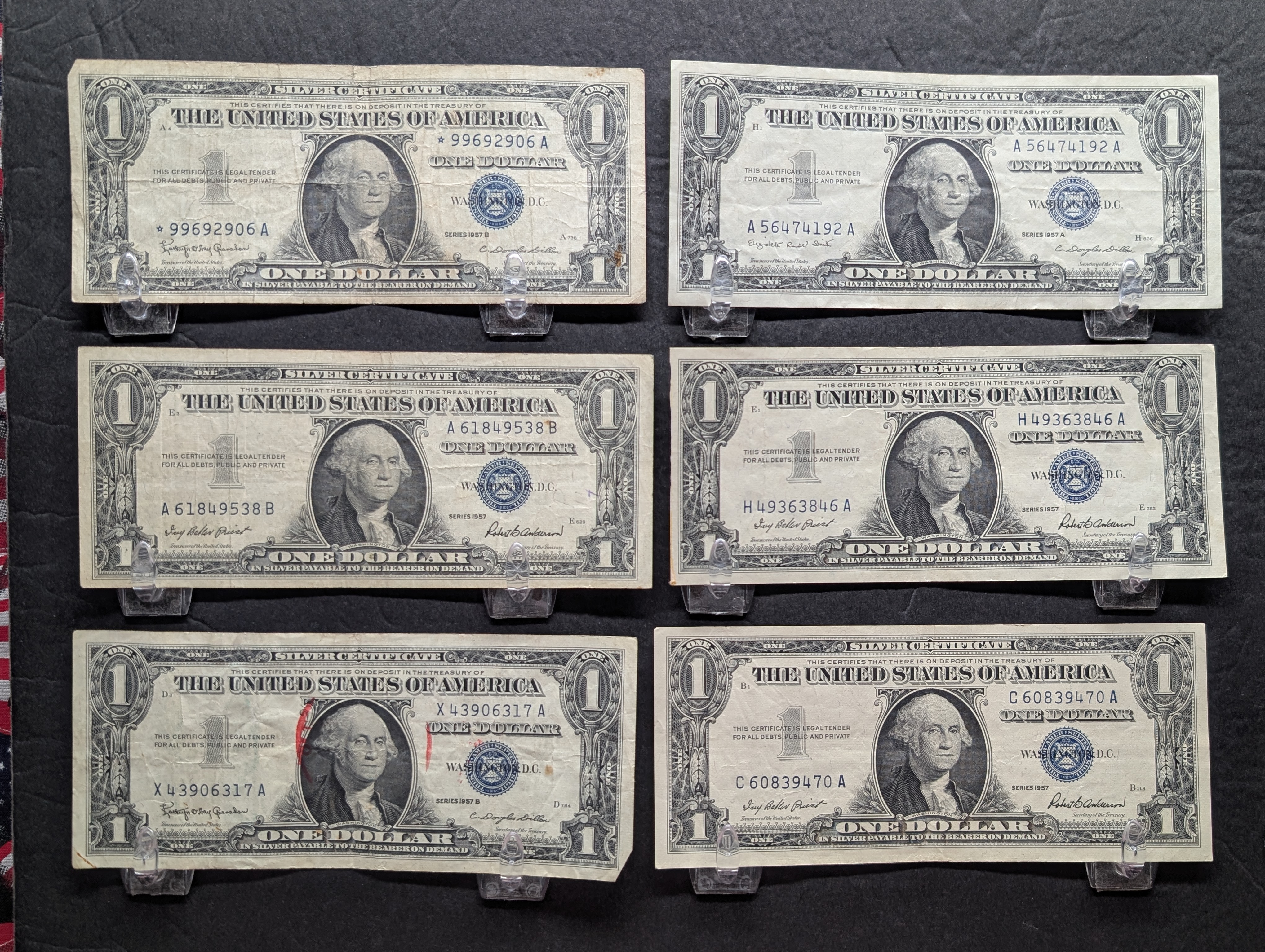 (3) 1957, (1) 57-A, (2) 57-B Series $1.00 Silver Certificates - Including Star Note
