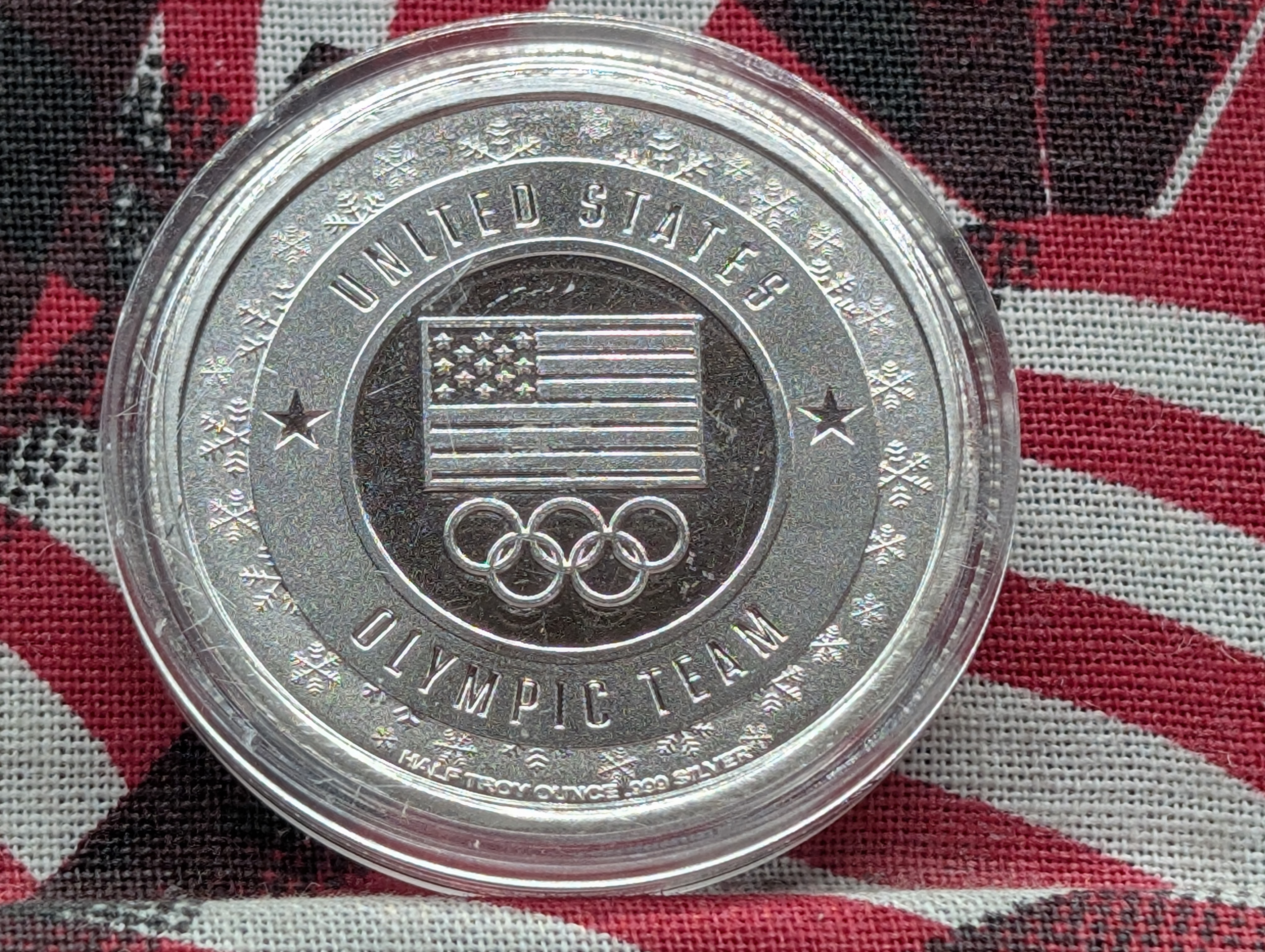 1/2 Troy Oz. .999 FINE SILVER U.S. Olympic Team Coach Snoop 2026 Designed Round in Capsule