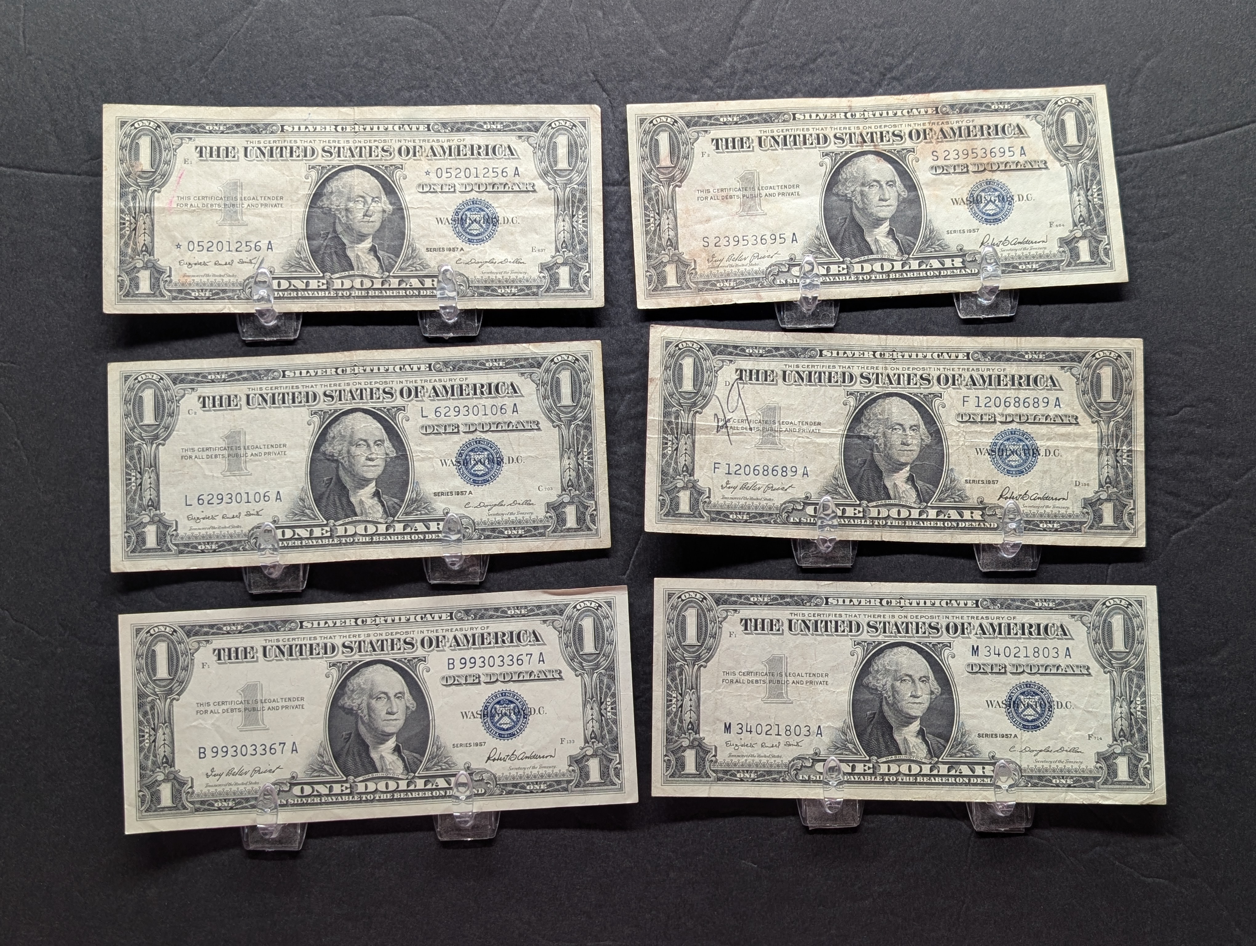 (3) 1957, (3) 57-A Series $1.00 Silver Certificates - Including Star Note