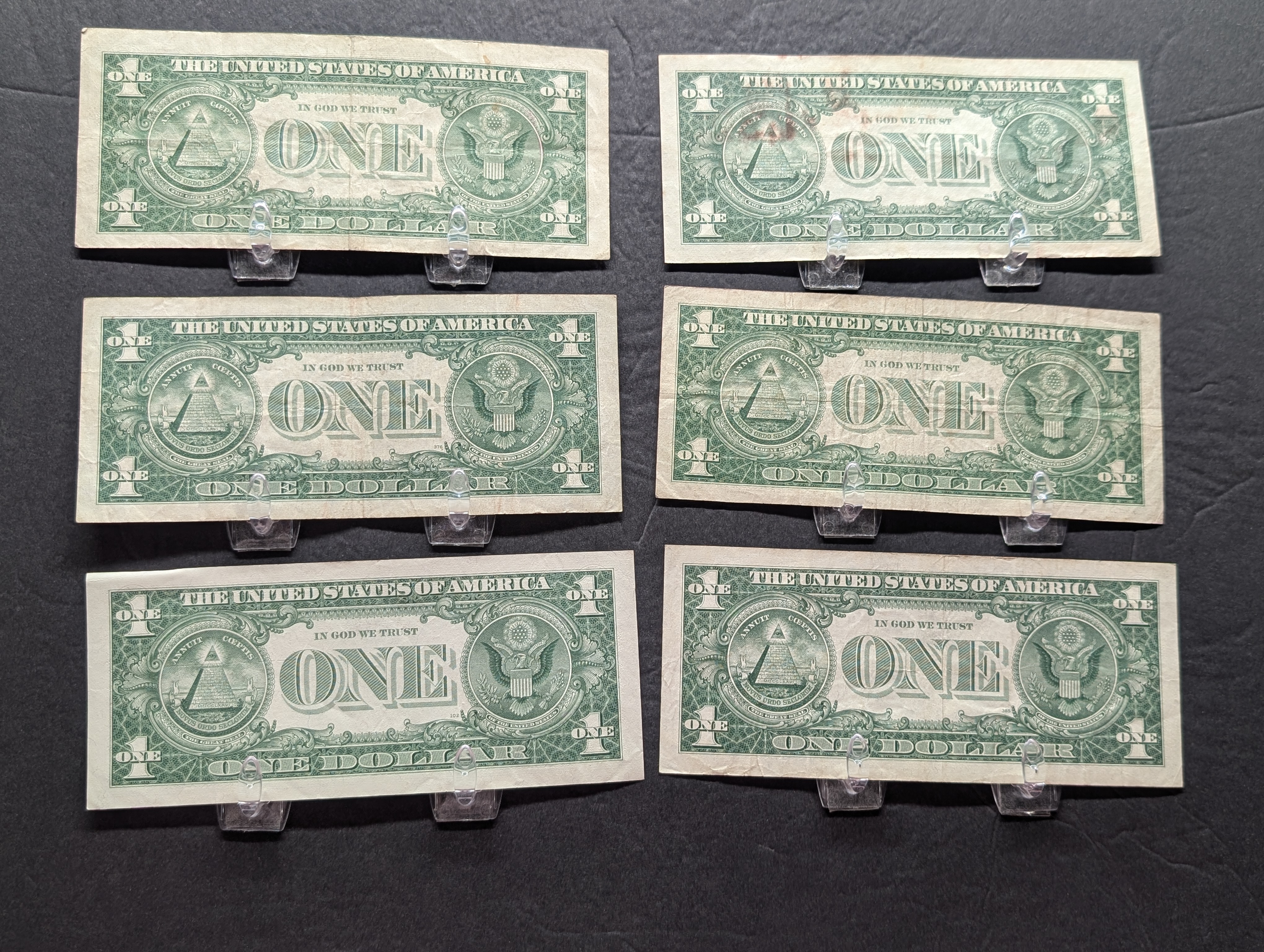 (3) 1957, (3) 57-A Series $1.00 Silver Certificates - Including Star Note