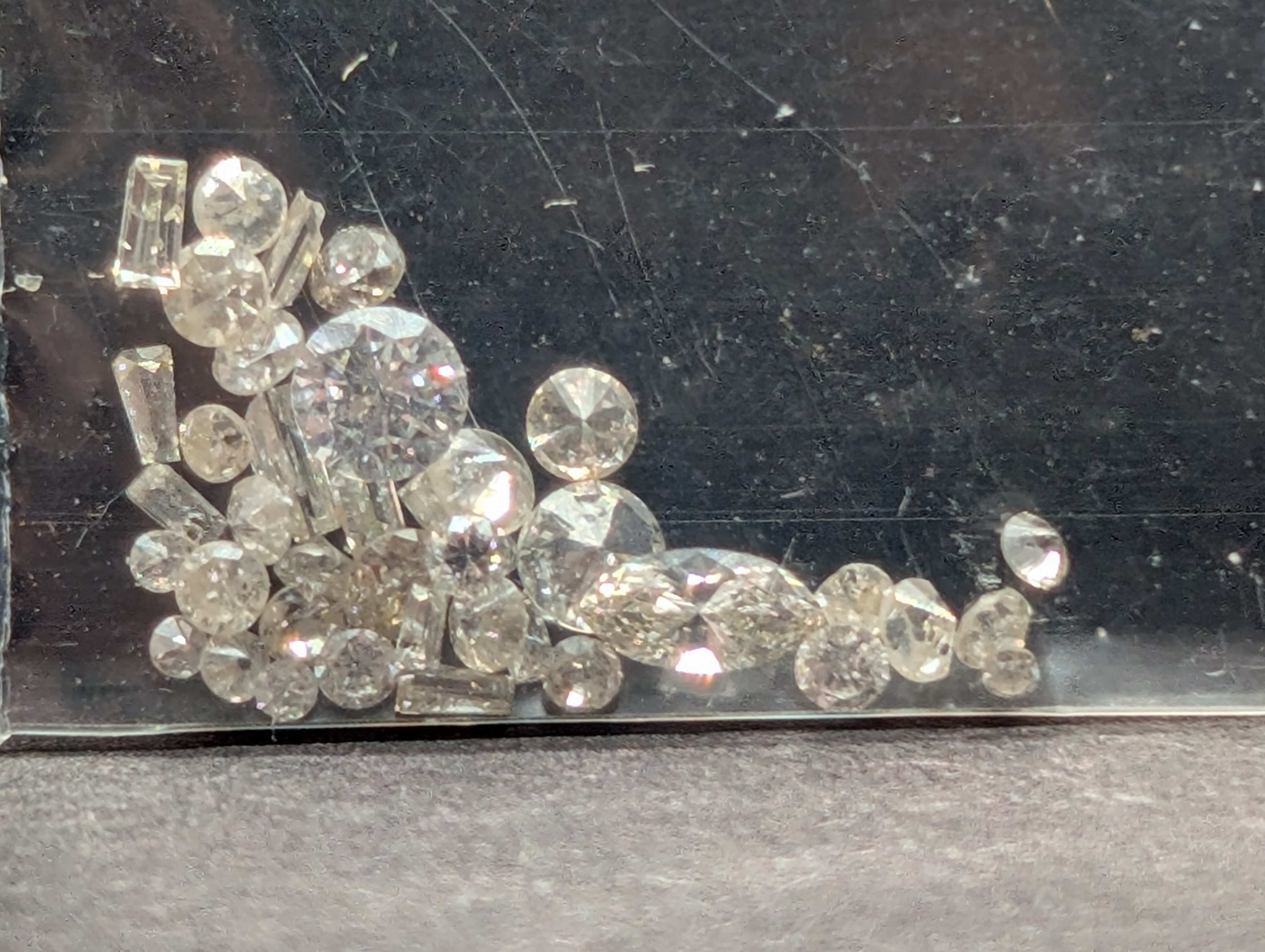 Bag of 0.63 Ct. of AWESOME Mixed Shaped Diamonds!
